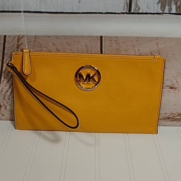 mk fulton large zip clutch
